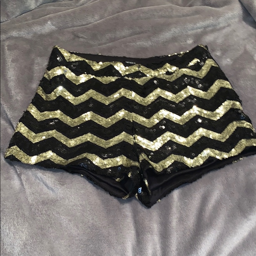 BLACK AND GOLD SEQUENCE BOOTY SHORTS
